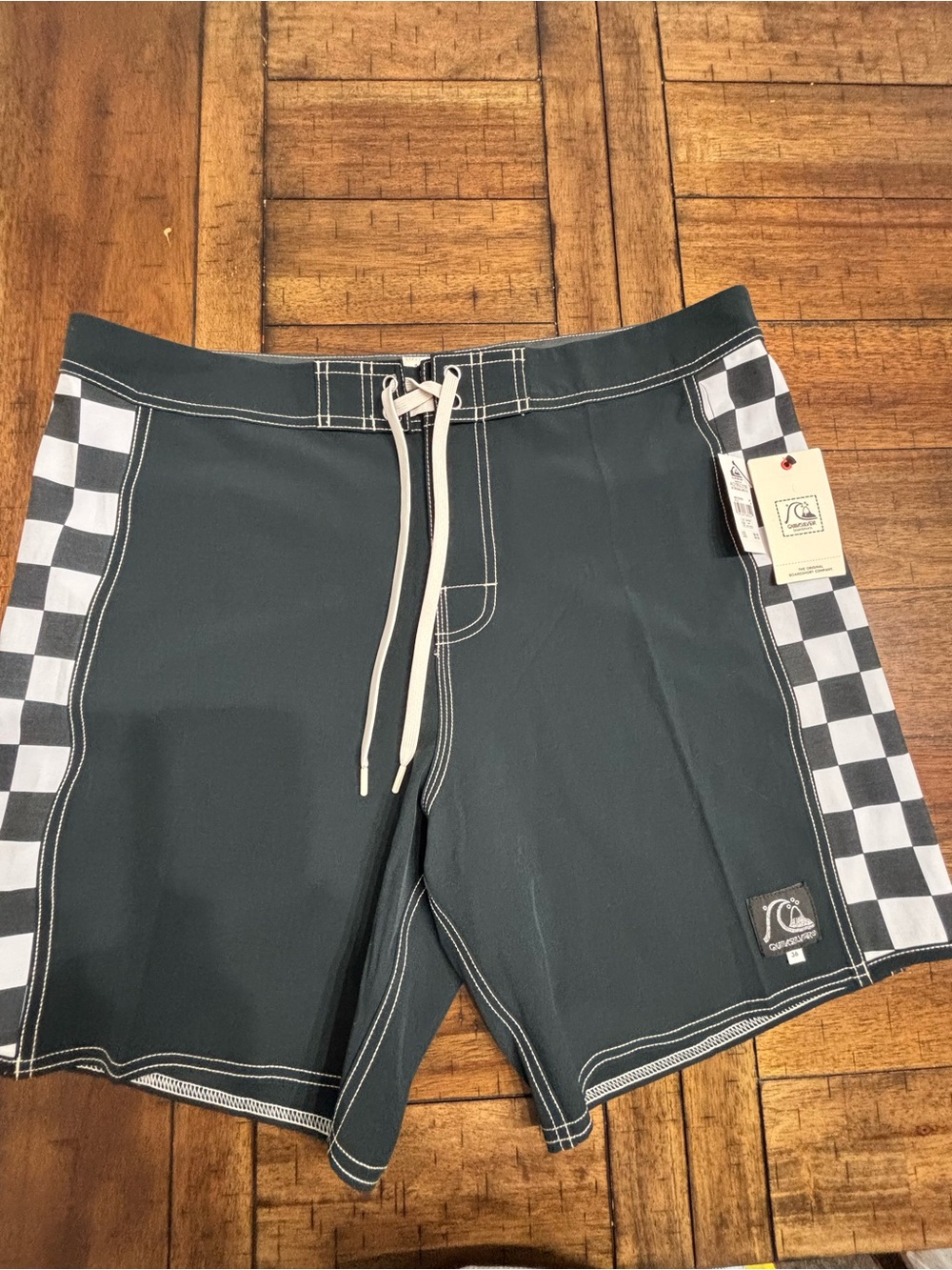 Quiksilver Black Board Shorts with Checkerboard Side Panels